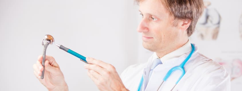 Doctor presenting shoulder endoprothetics - Colorado Center of Orthopaedic Excellence Joint Replacement Options