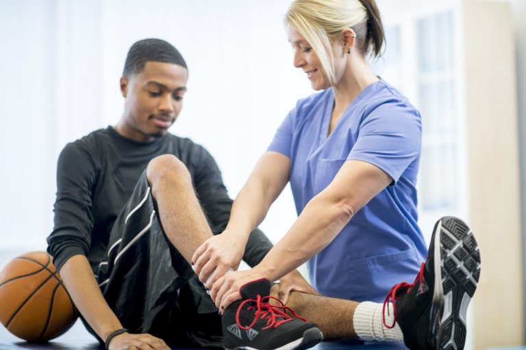 Basketball Player Getting Physical Therapy Colorado